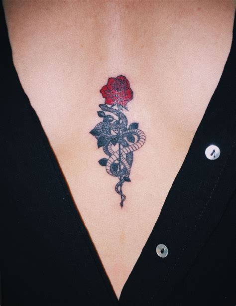 Unleash Your Femininity with a Stunning Rose Breast Tattoo!